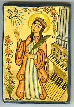 Icon of St Cecilia standing next to the organ.